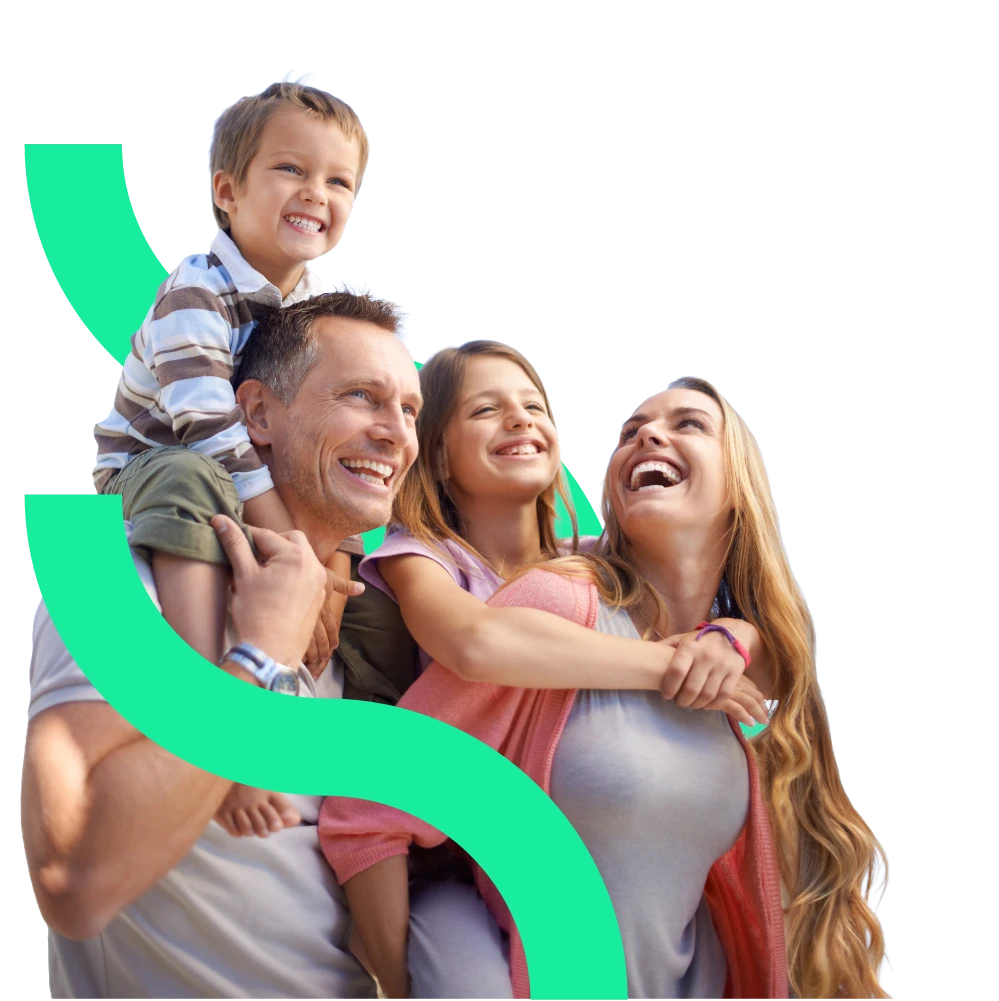 A happy family of four laughing together