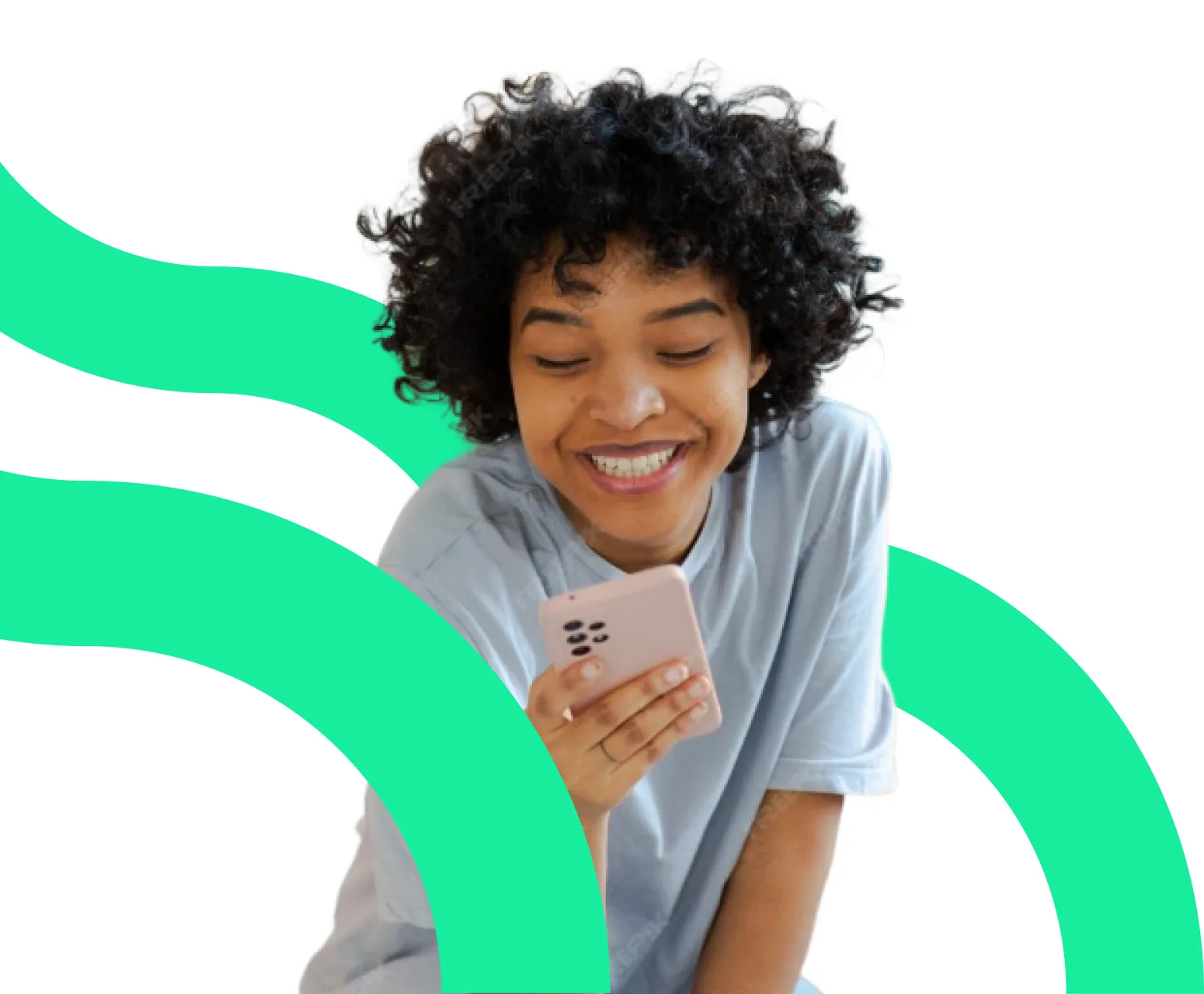 A woman smiling at her phone